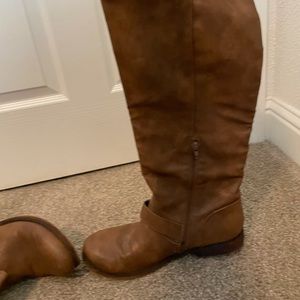 Tall brown boots by Carlos Santana. Good condition